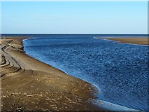 TF7544 : Tidal inlet to the salt marshes at Titchwell, Norfolk by Richard Humphrey