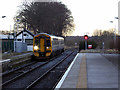 A train from Aberdeen approaching Nairn station