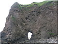 NO6952 : Natural arch in a promontory at Lunan Bay by Adrian Diack