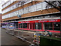 Fenced-off former Carpet Direct shop, Regent House, Wrexham