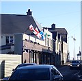 The Home Nations Flags flying above The Anchor Bar in Bryansford Road