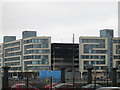 Burnt  out  shell  of  car  park  at  Liverpool  Arena