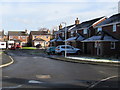 Snow remaining on north facing roofs in Penyffordd, Flintshire