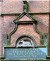  Carving and inscription above the Filling Station