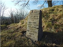 NS7993 : Boer War memorial stone by Lairich Rig
