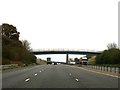 The M65 runs under a footbridge