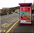 Santander advert on a Pwll Road bus shelter, Pwll, Carmarthenshire