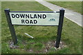 TQ3405 : Downland Road sign by Geographer