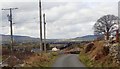 Approaching the Bog Road junction on the Upper Fathom Road