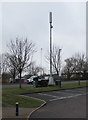 Telecoms mast and cabinets at the southern edge of Newport Retail Park