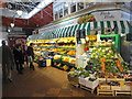 Greengrocer in the Covered Market