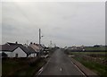 J3618 : Houses between the A2 (Kilkeel Road) and the sea by Eric Jones