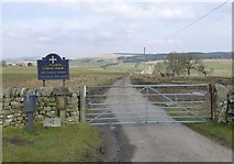 NY8889 : Gateway to St Cuthbert's Corsenside and The Brigg by Russel Wills