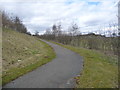 NY5928 : Cycle path descending from the A66 at Winderwath Farm by Christine Johnstone