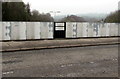 Plaques on the side of The Highway road and railway bridge, New Inn