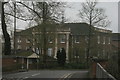 TL4601 : View of a building in the Theydon Bower complex on Bower Hill from the junction of Station Road and Bower Hill by Robert Lamb