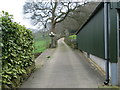 Footpath to Denholme Gate Road (A644) making use of the driveway at Throstle Nest