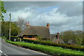 Thatched cottages beside the A338 at Sunton