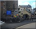 Stained glass window appeal on the corner of Dawlish Street