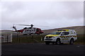 Coastguard vehicle and helicopter at Tingwall Airport