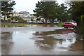 A rather wet car park, Dawlish Warren