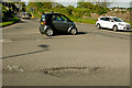 A structural failure in the road surface at the Junction between Manteo Way and the B3233