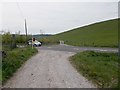 SJ9778 : Farm track crossing the B5470 Macclesfield Road by Antony Dixon