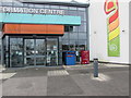 Blue bin at the entrance to Paignton Library and Information Centre