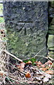 Benchmark on Thwaites Brow Road gatepost