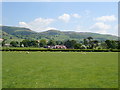 View across the field to Cefn Coch farm and the Clwydian Hills