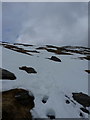 NN3240 : Snow-covered path climbing into Coire Reidh by Richard Law