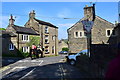 The Pennine bridleway passes through the streets of Hayfield.