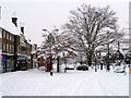 A snowy Crawley High Street by the Jubilee Oak