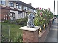 Stone lion on Huxley Sayze, Edmonton