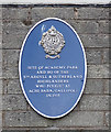 Blue plaque marking the site of Academy Park