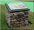 A cairn and information board at the Rowan Boland Play Park at Galashiels