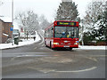 Route T33 bus in falling snow, Croydon