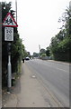 School 20 when lights show warning sign at the edge of Lyme Regis