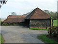 Barns by path junction