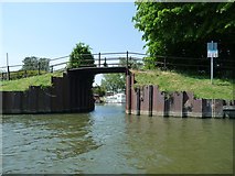 TL5479 : Towpath bridge over the entrance to a small marina, Ely by Christine Johnstone