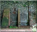 Gravestones in a wall