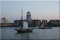 TQ3778 : View of a tall ship awaiting departure time on Greenwich Reach from St. David's Square by Robert Lamb