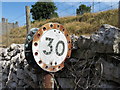 SK0967 : Old speed limit sign in Earl Sterndale by Gareth James