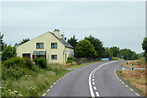 W4149 : House on the N71 near to Pedlars Cross Roads by David Dixon