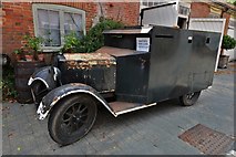 TL8647 : Long Melford, Kentwell Hall: WWII homeguard armoured car on display in the stable block by Michael Garlick