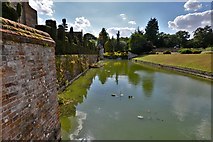 TL8647 : Long Melford, Kentwell Hall: The moat from the moat steps by Michael Garlick