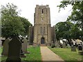 The Church of St John the Evangelist and part of the graveyard at Worsthorne