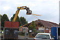 Demolishing clubhouse, Oakdale Golf Course