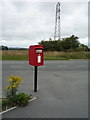 NZ3359 : Elizabeth II postbox on the A1290 by JThomas