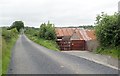 Tin roofed farm buildings on the east side of Lough Road